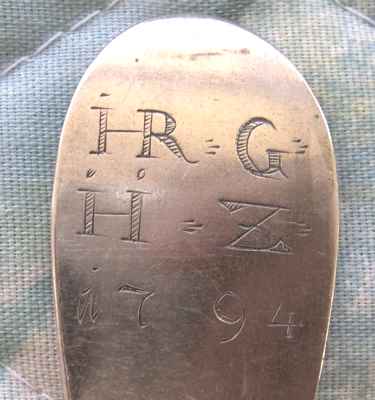 spoon showing two sets of initials and the year 1794