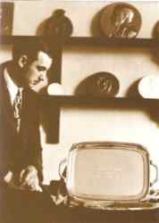 Early 1960s: Joe Calafato with a silver presentation tray