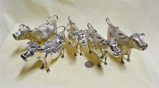 a 'herd' of silver cow creamers