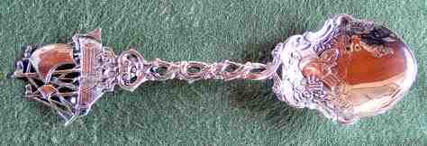 silver decorative spoon with cargo finial