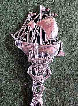 silver decorative spoon with cargo finial