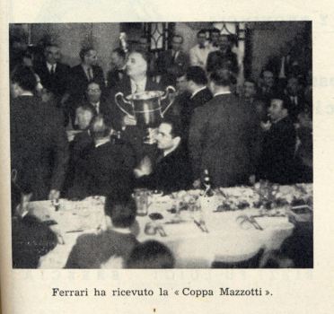 Enzo Ferrari receives the winner's prize