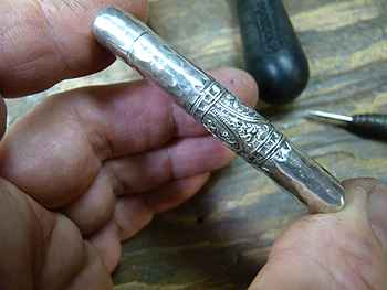 Jeffrey Herman restoring a sterling match safe