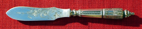 A cheese knife made from 95 % sterling silver