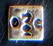 the 'knight' chess figure in a square box between two letters 'O' and 'C'