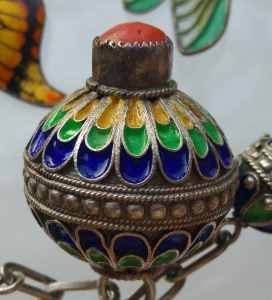 Close up of cloisonn enamel necklace