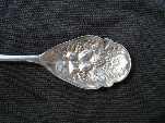 silver plate berry spoon made by J.H. Potter