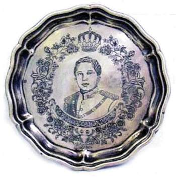 engraving on a Iraq made silver salver, circa 1950, featuring a bust of the King and the Iraqi Crown