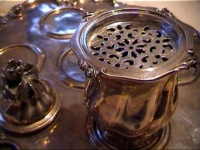 silver inkstand: detail